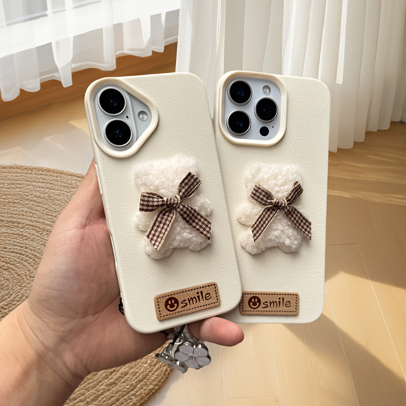 A Single-Pack Plush Teddy Bear Phone Case with a Bow, Available in White And Brown. It Comes with a Wrist Strap And Features a Simple And Elegant Faux Leather Texture That Is Anti-Slip And Fingerprint-Resistant. Made with TPU